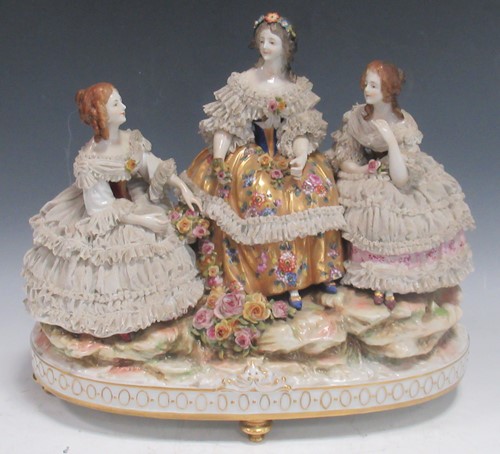 Lot 38 - Porcelain figure group of three girls