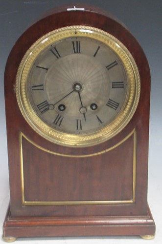Lot 201 - A mahogany mantel clock with arched top, the...