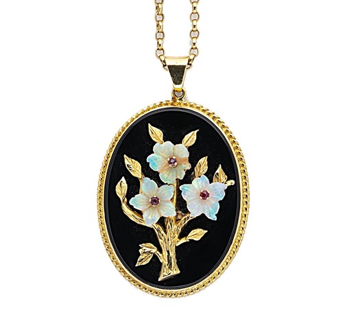 Lot 40 - An onyx, opal and ruby pendant and chain