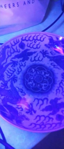 Lot 18 - A Chinese blue and white plate decorated with...