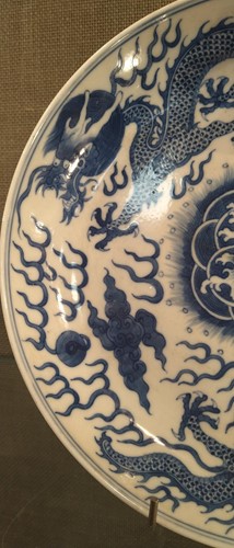 Lot 18 - A Chinese blue and white plate decorated with...