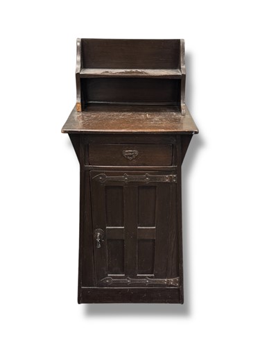 Lot 788 - An Arts and Crafts style cupboard of tapered...