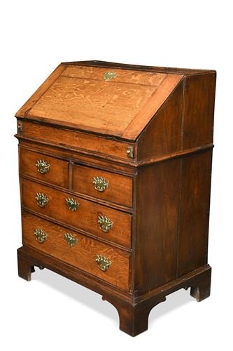 Lot 456 - A George II oak bureau