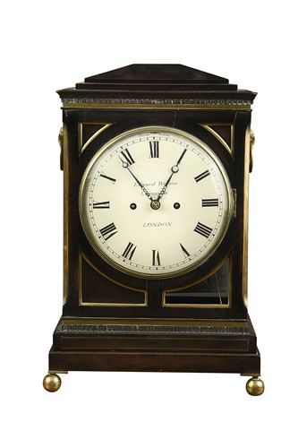 Lot 611 - A Regency ebonised bracket clock