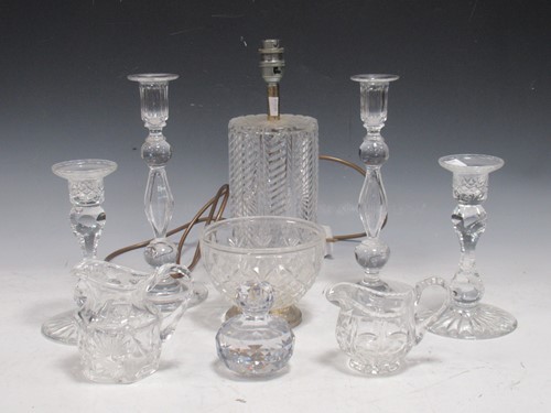 Lot 122 - A pair of cut glass crystal candlesticks, with...