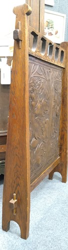 Lot 175 - Liberty & Co., an Arts & Crafts tooled leather and oak fire screen