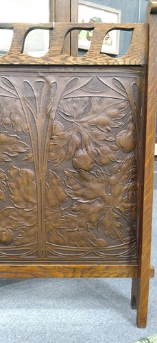 Lot 175 - Liberty & Co., an Arts & Crafts tooled leather and oak fire screen