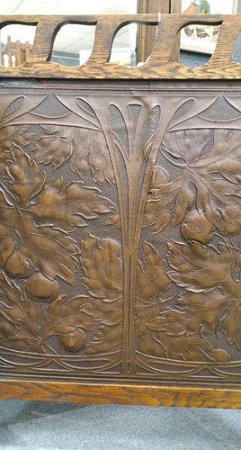 Lot 175 - Liberty & Co., an Arts & Crafts tooled leather and oak fire screen