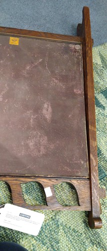 Lot 175 - Liberty & Co., an Arts & Crafts tooled leather and oak fire screen