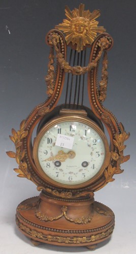 Lot 202 - A late 19th century French gilt metal lyre...