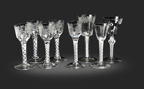 Lot 627 - A set of four George III wine glasses