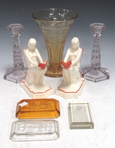 Lot 144 - A pair of Art Deco pottery book ends, female...
