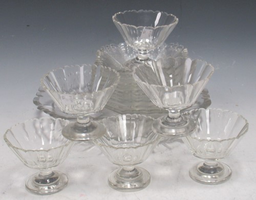 Lot 148 - Set of facet cut glass Art Deco sundae dishes...