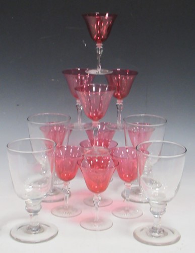 Lot 123 - Set of 20th century cranberry glass martini...