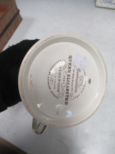 Lot 2 - Two Wedgwood commemorative mugs designed by...