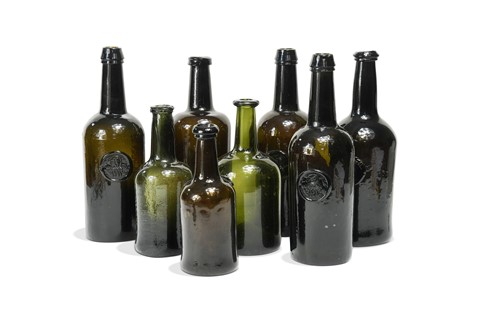 Lot 402 - Three green glass wine bottles, 18th century