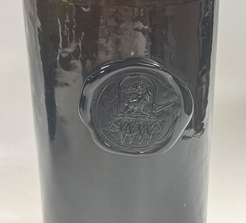 Lot 402 - Three green glass wine bottles, 18th century