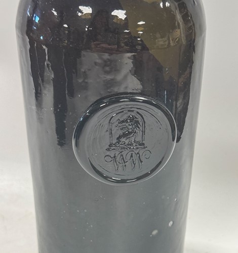 Lot 402 - Three green glass wine bottles, 18th century