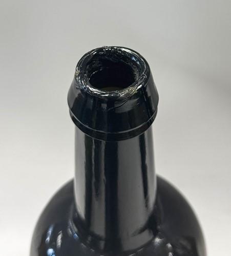 Lot 402 - Three green glass wine bottles, 18th century