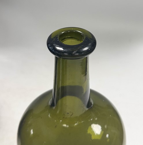 Lot 402 - Three green glass wine bottles, 18th century