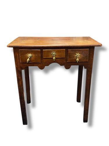 Lot 691 - An 18th century style oak low boy, three...