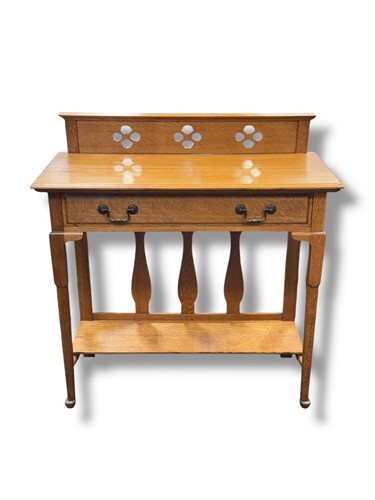 Lot 697 - An early 20th century oak side table, with...
