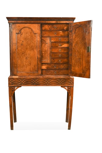 Lot 457 - A George III yew wood collector’s cabinet on stand