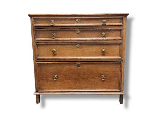 Lot 549 - An 18th century oak chest of drawers, with...