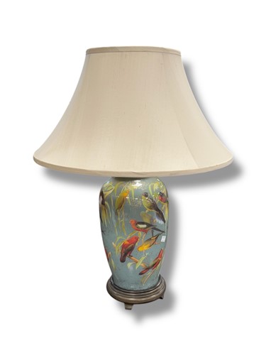 Lot 792 - A large glass vase shaped lamp decorated with...