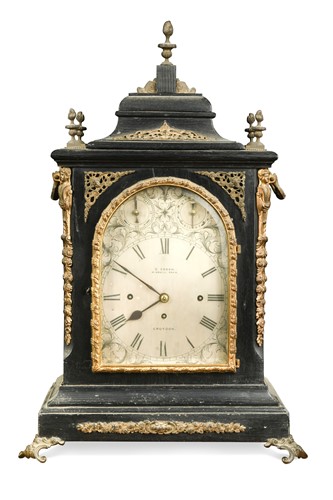 Lot 721 - A Victorian ebonised and gilt metal mounted chiming table clock