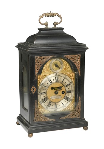 Lot 602 - A George III ebonised bracket clock
