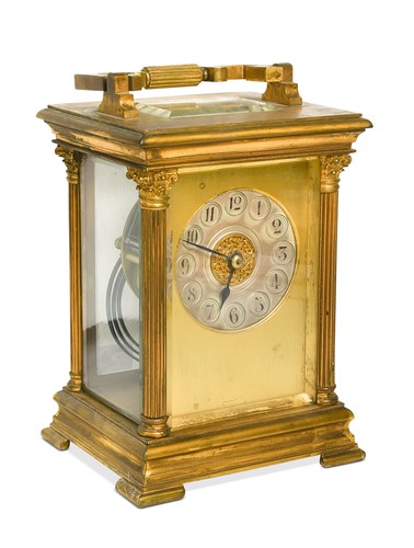 Lot 639 - A French brass carriage-clock style mantel clock, 19th century
