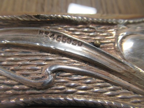 Lot 372 - An Art Nouveau silver picture frame...