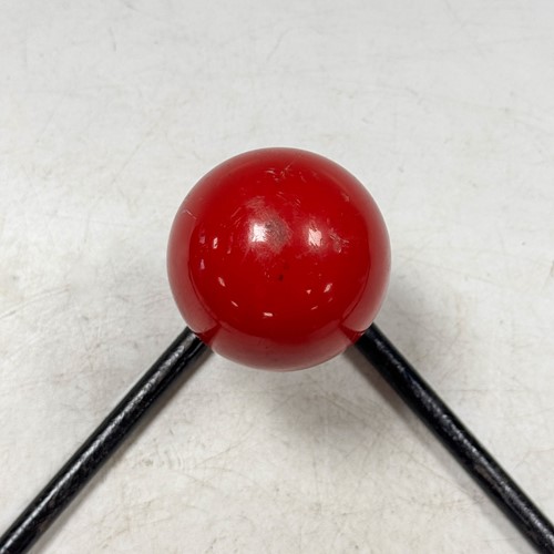 Lot 141 - A mid-century 'atomic' style coat rack, mid/late 20th century