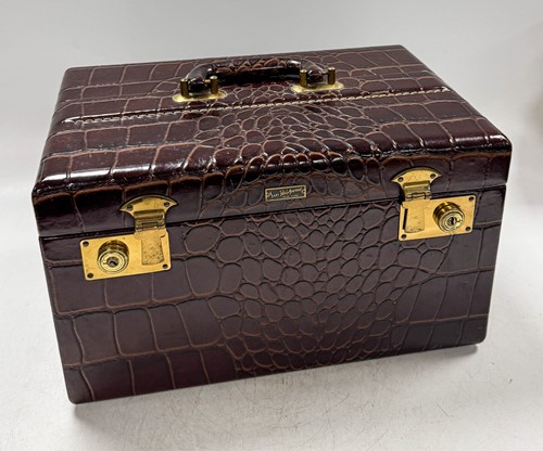 Lot 147 - Saks Fifth Avenue, a vintage crocodile grained leather vanity case