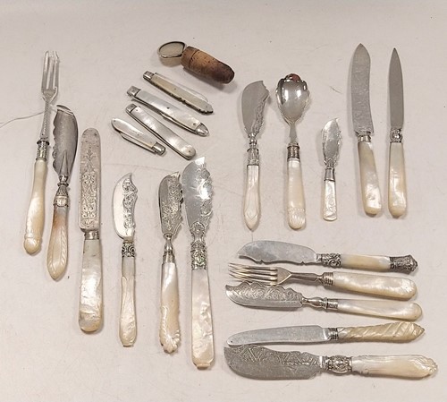 Lot 351 - A collection of mother of pearl mounted...