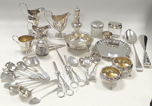 Lot 346 - A collection of silverware including milk jugs,...