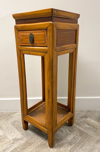 Lot 756 - A Chinese hard wood stand with single drawer...