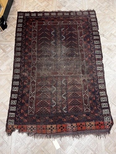 Lot 865 - A Bokhara rug with quartered field and...