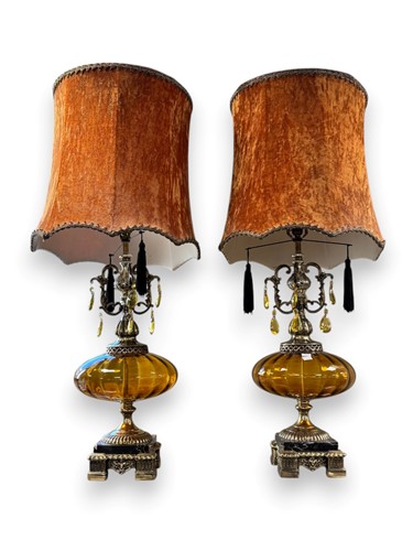 Lot 188 - A pair of bulbous amber glass vase lamps with...