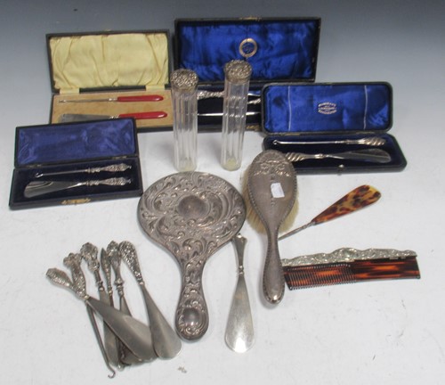 Lot 382 - Quantity repousse silver: a collection of...