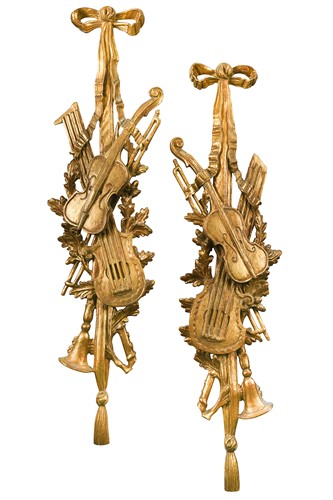 Lot 472 - A pair of carved giltwood wall appliqués, possibly Black Forest, late 19th or early 20th century
