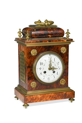 Lot 712 - A French tortoiseshell mantel clock, 19th century
