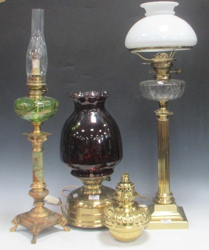 Lot 160 - A tall brass column lamp with cut clear glass...