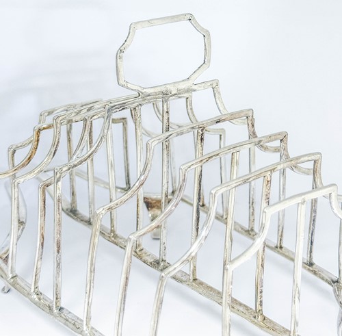 Lot 441 - A George III silver 9 bar toast rack
