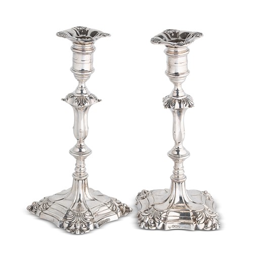 Lot 533 - A visual pair of George V silver candlesticks