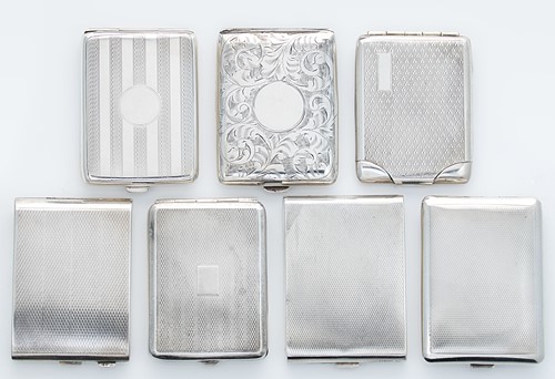 Lot 311 - A collection of 7 early 20th century silver book match holders