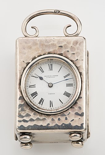 Lot 329 - An early 20th century silver boudoir clock