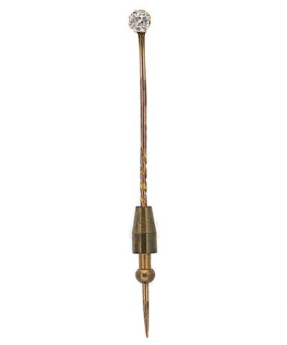 Lot 63 - A diamond set stick pin