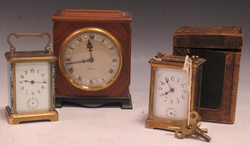 Lot 205 - A brass carriage clock in a travelling case, a...